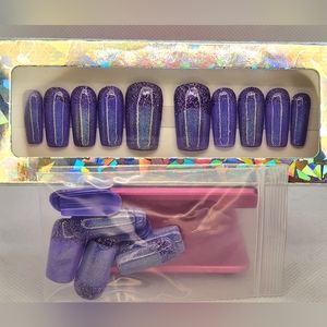 Purple, purple glitter on top, purple iridescent chrome on bottom. Press On Nail